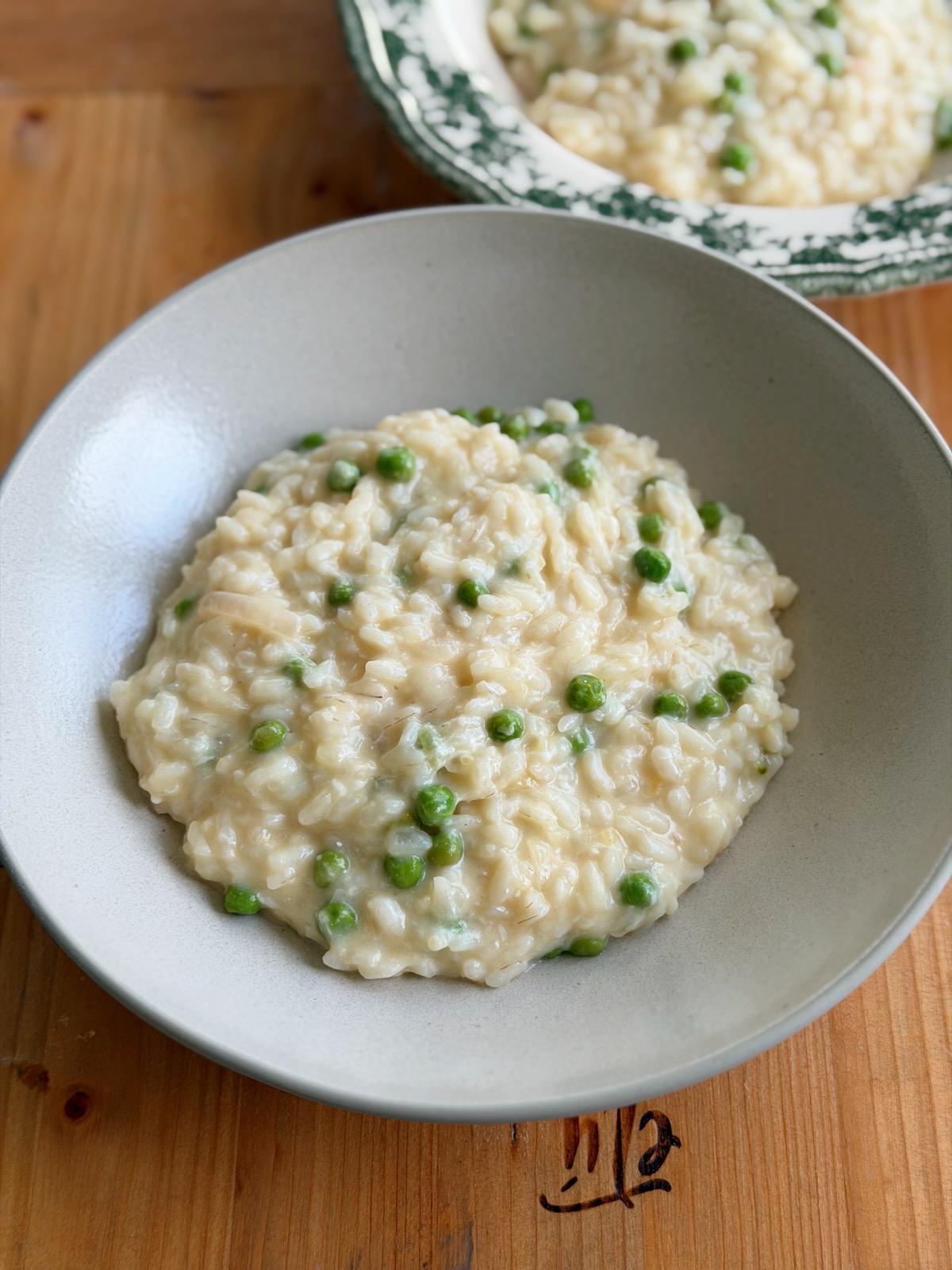 Risotto with Peas, Parmesan and Mozzarella!! So delicious and comforting and although it takes a little time, absolutely worth it!