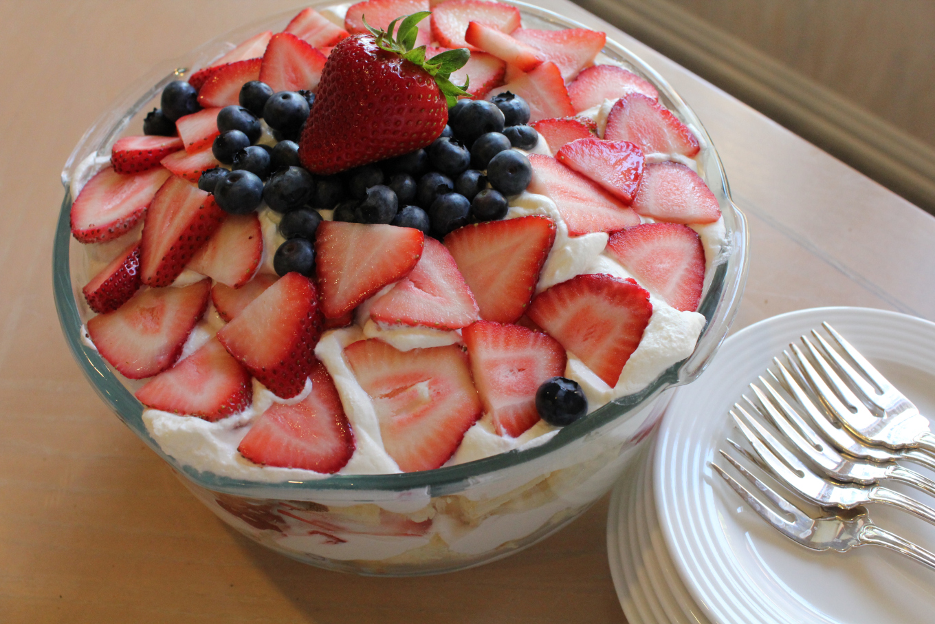 Red White and Blueberry Trifle in a glass dish.