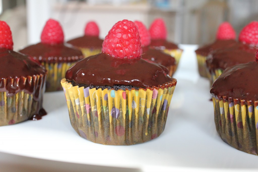 Rich and delicious Chocolate Raspberry Cupcakes with raspberry jam and chocolate ganache!  So EASY to bake, you've got to try this recipe! 