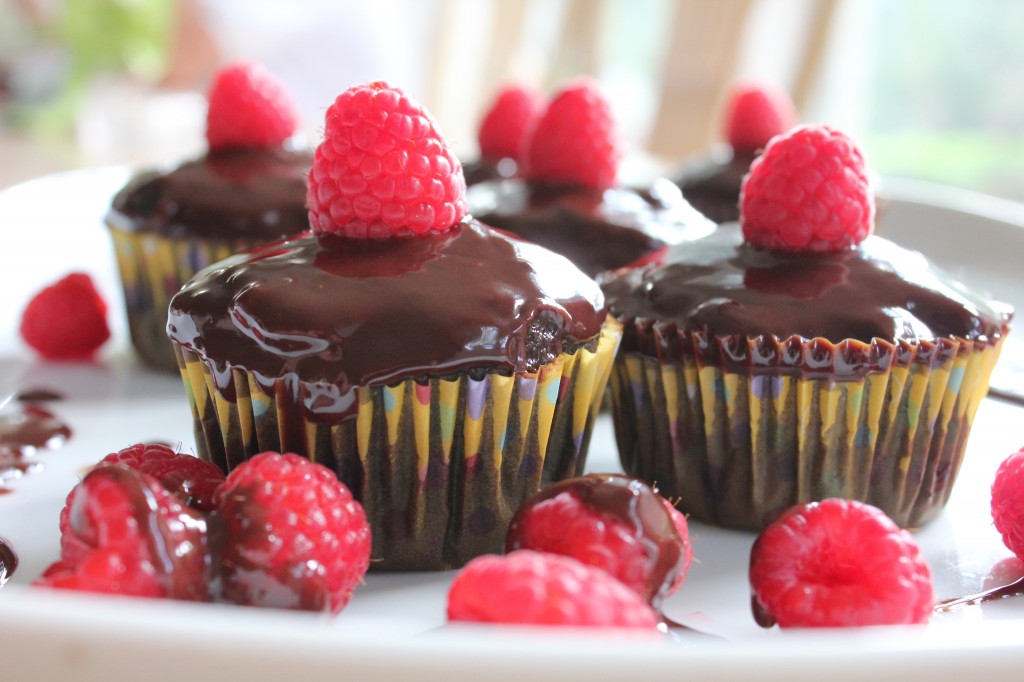 Rich and delicious Chocolate Raspberry Cupcakes with raspberry jam and chocolate ganache!  So EASY to bake, you've got to try this recipe! 