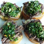 Little Toasts with Braised Beef and Chimichurri Sauce! A delicious treat any time of the year! The chimichurri sauce adds so much flavor!