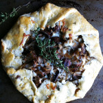 Beautiful Mushroom, Onion and Thyme Galette! I love the gorgeous rustic look of a freeform galette! Filled with mushrooms, thyme and shredded mozzarella cheese, this is rewarding to make and eat!