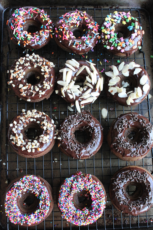 Triple Chocolate BAKED Doughnuts. .  SO good and so easy to make! Top them differently for an assortment of doughnuts! 