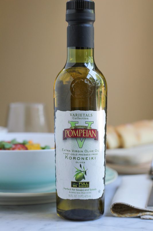 A bottle of olive oil for Summer Caprese pasta salad.