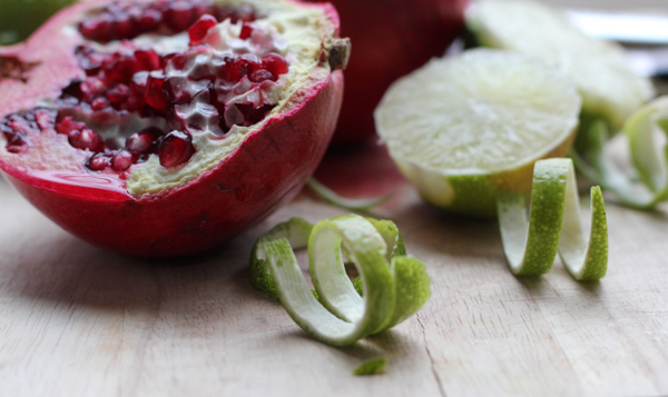 Ring in the New Year with this delicious, easy-to-follow Pomegranate Cosmopolitan recipe. This might become your favorite cocktail. #cocktail #cocktailrecipe #pomcosmos #newyearseve