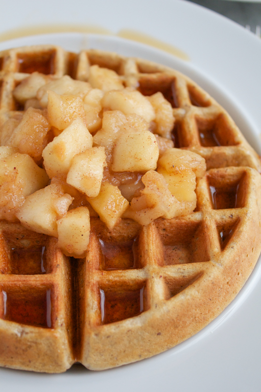 Whole Wheat Hazelnut Waffles with Cinnamon Sautéed Apples. Homemade waffles using whole-wheat pastry flour and hazelnut flour. Your breakfast or holiday brunch never looked so good. #breakfast #brunch #holidays #waffles