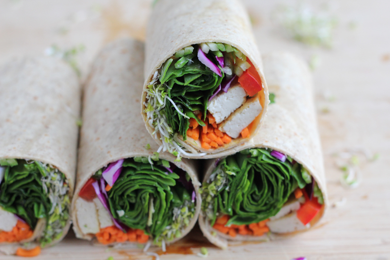 Packed with protein-rich tofu and a ton of veggies, this Tofu Spinach Power Wrap is just the thing you need to eat healthier. So, go ahead and eat the entire thing! There&rsquo;s nothing here to feel guilty about. #healthy #wraps #vegetarian #asianfood