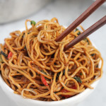 vegetable chow mein in bowl with chopsticks