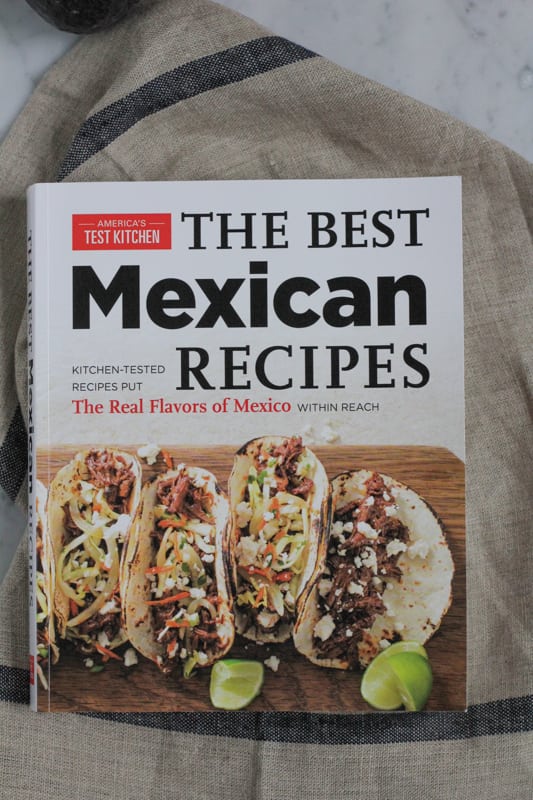 Cookbook with Corn and Black Bean Tortilla Tart recipe.