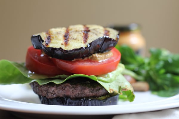 Grilled Eggplant Bun Burger on a plate.