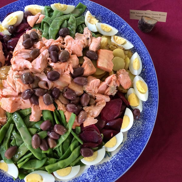 A plate of wild salmon with beets.
