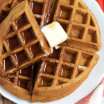 Gingerbread Pumpkin Waffles! Richly spiced with cloves, nutmeg, cinnamon and ginger, these waffles get an additional boost of flavor from finely diced candied ginger. Don’t miss these waffles!