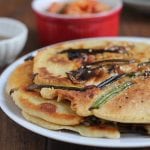 Korean Kimchi Scallion Pancakes! Packed with scallions, mushrooms and kimchi, these pancakes are delicious and easy to make!