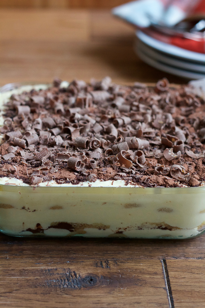 Rich, creamy and delicious Tiramisu. Mascarpone custard layered with cocoa powder and brandy and espresso soaked ladyfingers. EASY to make and amazing!