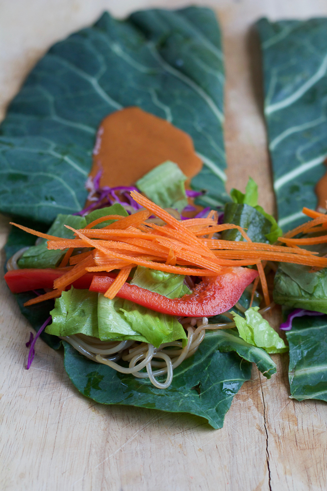 Spicy Asian Collard Green Wraps + A Giveaway!! Fresh, healthy and packed with vitamins, fiber and a ton of fresh veggies, you have to try my Spicy Asian Collard Green Wraps!! These are so easy to make and the peanut sauce is amazing!!