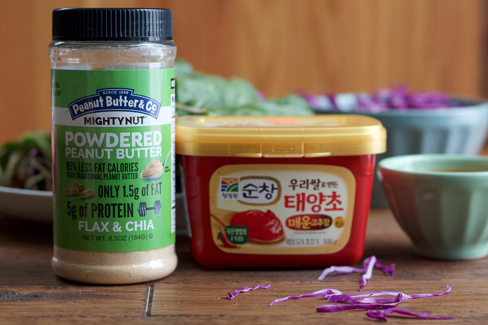 Spicy Asian Collard Green Wraps + A Giveaway!! Fresh, healthy and packed with vitamins, fiber and a ton of fresh veggies, you have to try my Spicy Asian Collard Green Wraps!! These are so easy to make and the peanut sauce is amazing!!