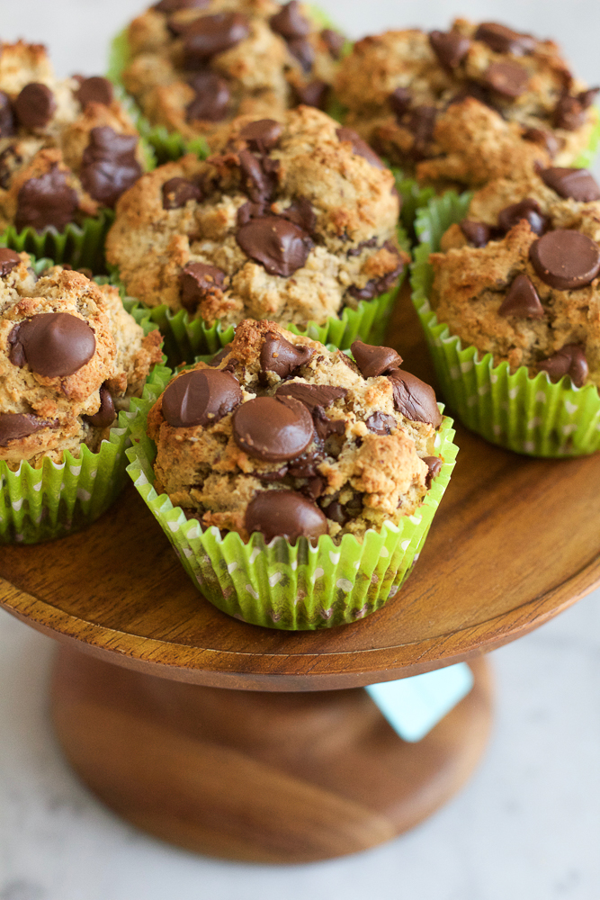 Healthy Wheat Almond Coconut Flaxseed Muffins! Made with a wheat and almond flour, coconut flour and ground flaxseed, these muffins have taste, texture and are filled with goodness! You don't have to feel guilty about indulging in one of these muffins!