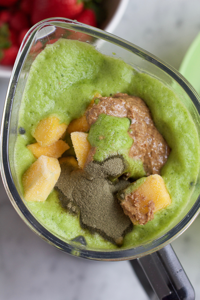 Spinach Berry Smoothie!! A refreshing spinach smoothie with bananas, mangos, almond butter and Next Step AppeFIT Mixed Berry Powder! You've got to try this!