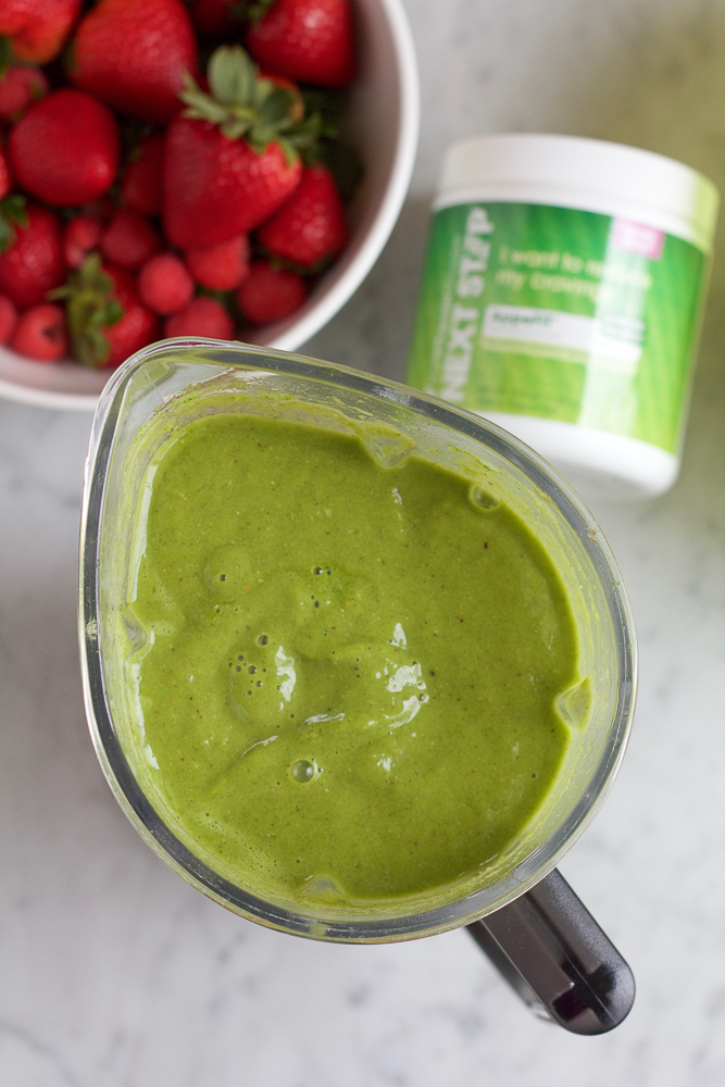 Spinach Berry Smoothie!! A refreshing spinach smoothie with bananas, mangos, almond butter and Next Step AppeFIT Mixed Berry Powder! You've got to try this!