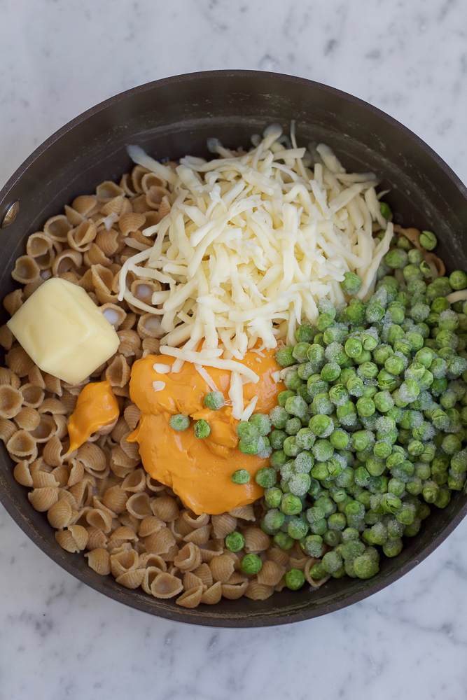 Fancy Mac and Cheese with Spinach and Peas!! Give your regular ole macaroni and cheese a much needed makeover! Mix in some fresh spinach, peas and tuna for some added protein! Your entire family will be asking for seconds!