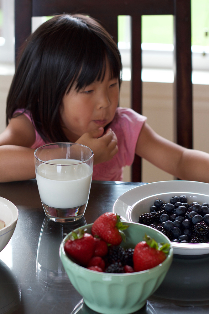 Blueberry Zucchini Muffins! Paired with milk, these muffins are a nutritious way to start the day and fuel your family! 