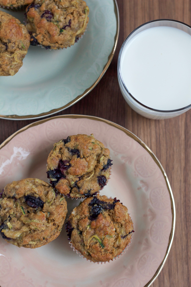 Blueberry Zucchini Muffins! Paired with milk, these muffins are a nutritious way to start the day and fuel your family! 