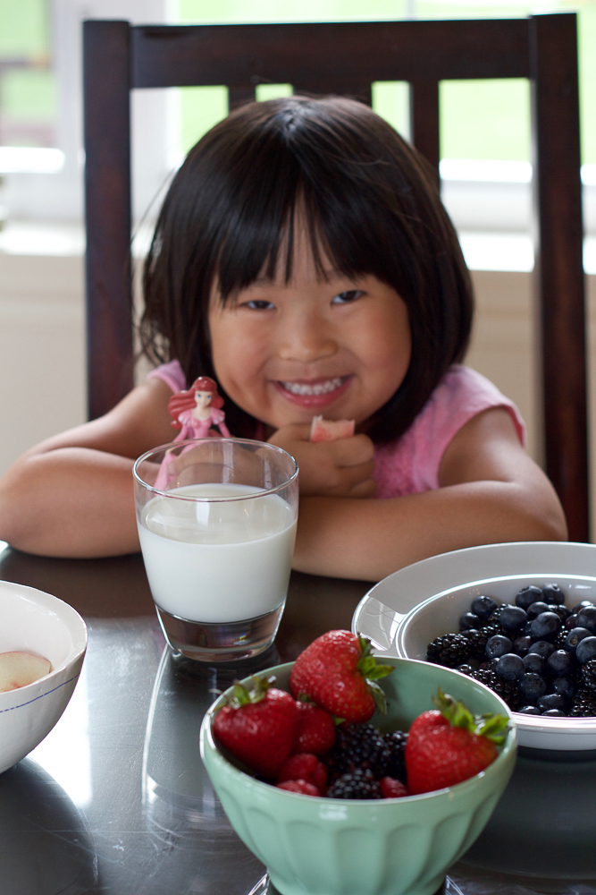 Blueberry Zucchini Muffins! Paired with milk, these muffins are a nutritious way to start the day and fuel your family! 