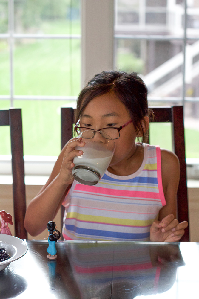 Blueberry Zucchini Muffins! Paired with milk, these muffins are a nutritious way to start the day and fuel your family! 