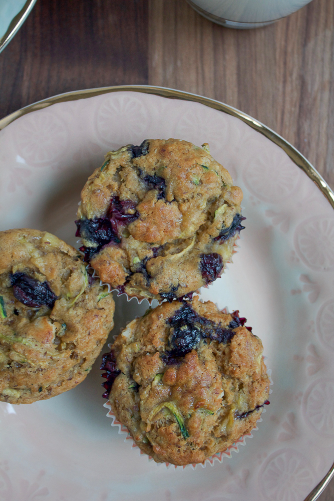 Blueberry Zucchini Muffins! Paired with milk, these muffins are a nutritious way to start the day and fuel your family! 