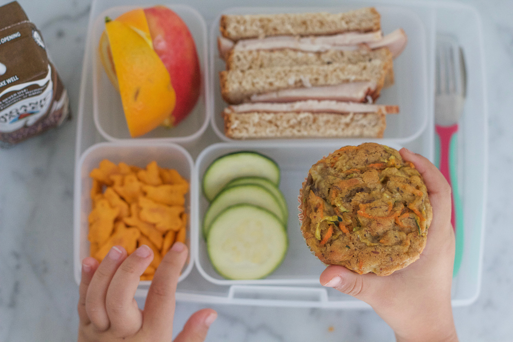 Zucchini Carrot Muffins!!! Packed with nutrition and colorful veggies, these muffins will make a wonderful, healthy addition to your child's lunch!