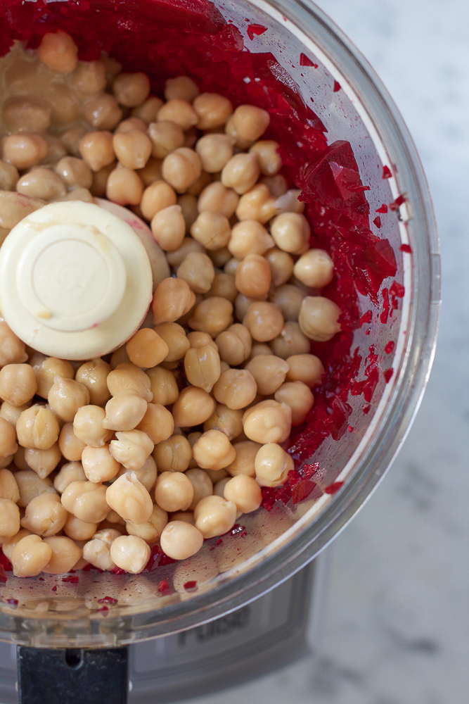 Roasted Beet Hummus. Try this delicious, vibrant twist on one of your favorite foods to snack on! Serve this beet hummus with raw veggies, chips and pita bread. This makes for a great party or appetizer platter.
