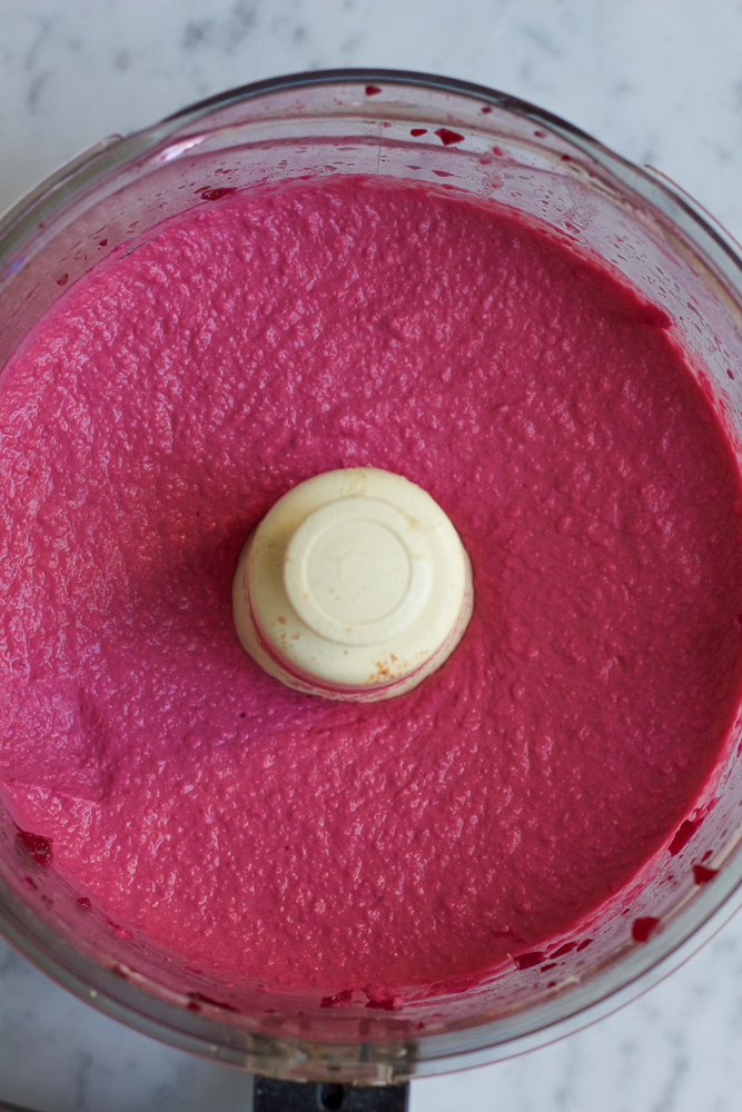 Roasted Beet Hummus. Try this delicious, vibrant twist on one of your favorite foods to snack on! Serve this beet hummus with raw veggies, chips and pita bread. This makes for a great party or appetizer platter.
