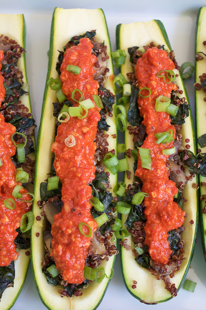 A row of Quinoa Stuffed Zucchini Boats.
