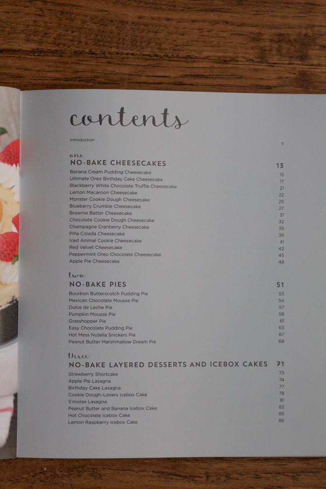 Hot Mess Nutella Snickers Pie!!! A creamy Nutella filling loaded with crushed peanuts and mini chocolate chips and topped with peanuts, whipped cream and bits of Snickers! This no bake pie is dessert heaven! From the cookbook, No-Bake Treats by Julianne Bayer.