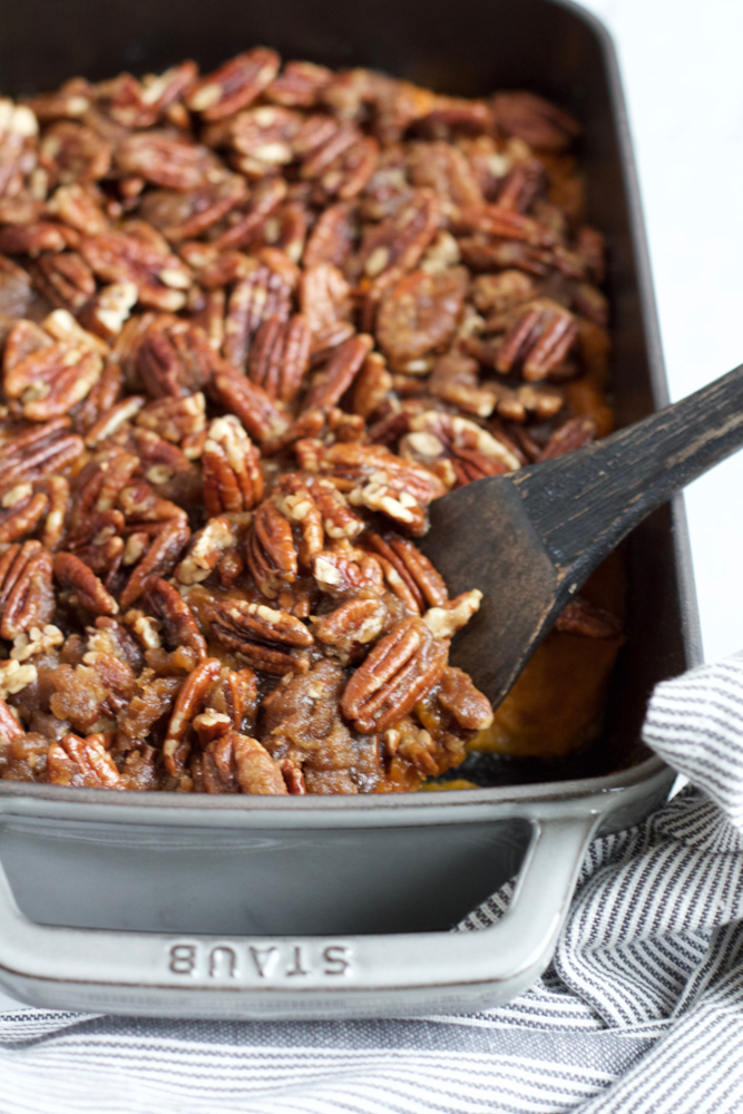Spiral Cut Double Glazed Brown Sugar Ham with Sweet Potato Casserole!! The perfect holiday dinner! A Spiral Cut Double Glazed Brown Sugar Ham from ALDI and my homemade Sweet Potato Casserole! Add some savory side dishes and you've got the best holiday dinner!