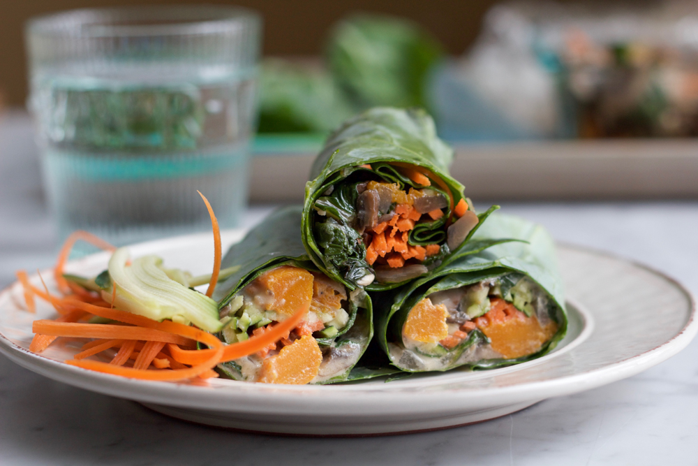 Roasted Butternut Squash Collard Wraps! A healthy and delicious way to enjoy some of your favorite veggies! Try them with homemade tahini sauce, or my spicy peanut sauce! Either way, make these wraps!