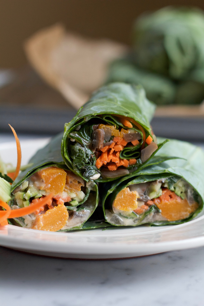 Roasted Butternut Squash Collard Wraps! A healthy and delicious way to enjoy some of your favorite veggies! Try them with homemade tahini sauce, or my spicy peanut sauce! Either way, make these wraps!