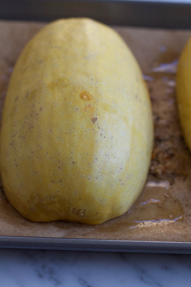 Spaghetti Squash Lasagna! So good and delicious and because one half squash is less than 400 calories, you won't feel guilty at all for eating this entire thing!