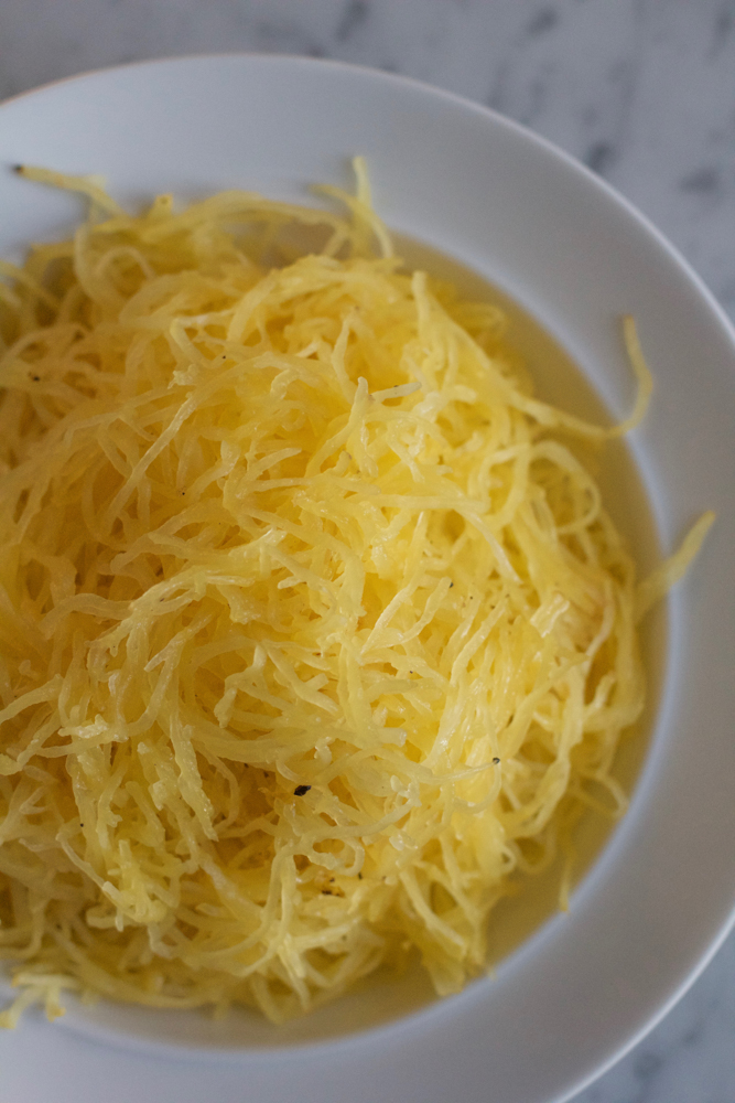 Spaghetti Squash Lasagna! So good and delicious and because one half squash is less than 400 calories, you won't feel guilty at all for eating this entire thing!