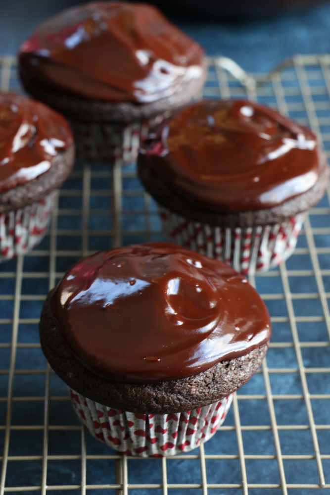 Vegan Chocolate Cupcakes with chocolate ganache! Made with almond milk, coconut oil, coconut sugar and more, you won't believe these are dairy and egg free! 