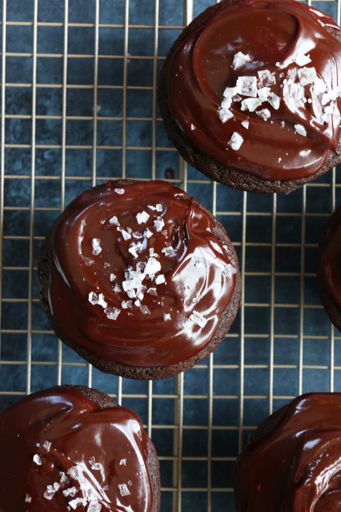Vegan Chocolate Cupcakes with chocolate ganache! Made with almond milk, coconut oil, coconut sugar and more, you won't believe these are dairy and egg free! 