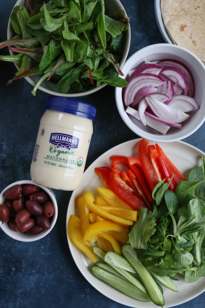 Mediterranean Veggie Wraps made with fresh veggies like spinach, bell peppers, cucumbers and red onions, and Hellmann&rsquo;s Organic Mayonnaise. So easy to make and delicious! #ad