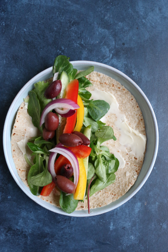 Mediterranean Veggie Wraps made with fresh veggies like spinach, bell peppers, cucumbers and red onions, and Hellmann&rsquo;s Organic Mayonnaise. So easy to make and delicious! #ad
