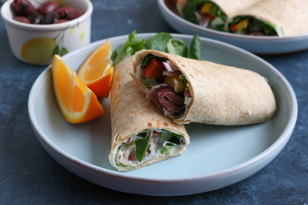 Mediterranean Veggie Wraps made with fresh veggies like spinach, bell peppers, cucumbers and red onions, and Hellmann&rsquo;s Organic Mayonnaise. So easy to make and delicious! #ad