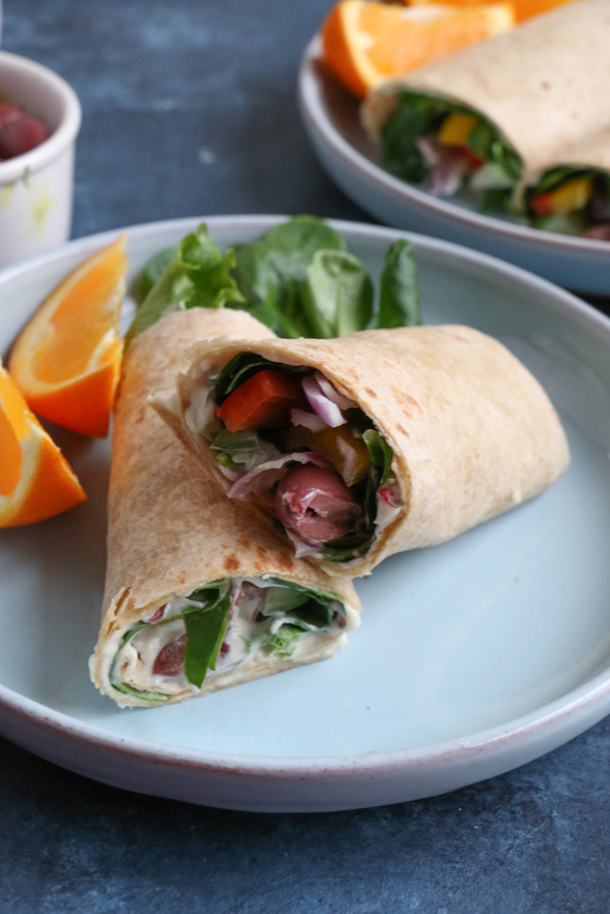 Mediterranean Veggie Wraps made with fresh veggies like spinach, bell peppers, cucumbers and red onions, and Hellmann’s Organic Mayonnaise. So easy to make and delicious! #ad