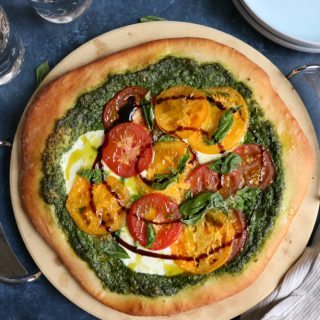 Delicious Caprese Pesto Pizza with a homemade pizza crust made with White Lily Flour! So good and so easy to make!