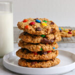 Gluten Free Monster Cookies! Thick, chewy and delicious! These are the perfect cookies to enjoy with a tall glass of milk!