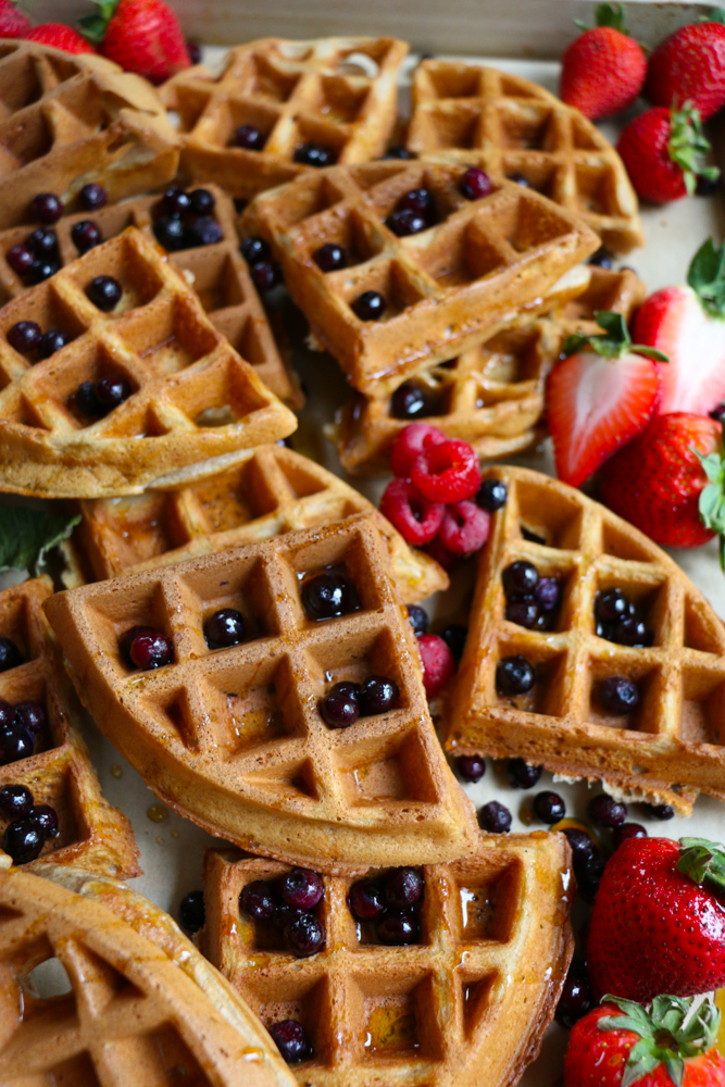 Easy Weekend Waffles + A Video! Make these delicious weekend waffles for your family, the kids or yourself! They are so easy to make and THE BEST tasting homemade waffles ever! Don't forget the fresh fruit and maple syrup!