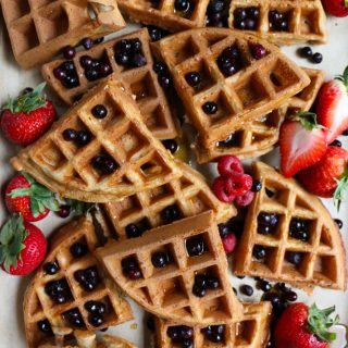 Easy Weekend Waffles + A Video! Make these delicious weekend waffles for your family, the kids or yourself! They are so easy to make and THE BEST tasting homemade waffles ever! Don't forget the fresh fruit and maple syrup!