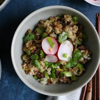 Beef and Ginger Fried Rice. Super easy to make and so flavorful and delicious! Top the fried rice with quick pickled radishes, or kimchi! Break out your wok and make this happen!